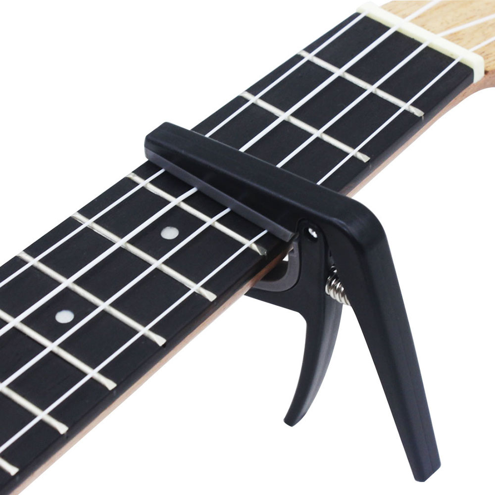 Musical Instrument Hawaii - Capo para Ukulele Profissional Preto, Braçadeira